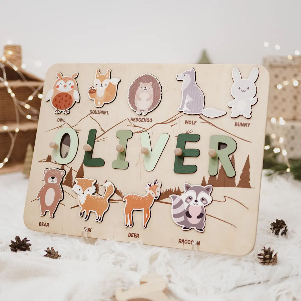 Wooden play pieces with animal illustrations