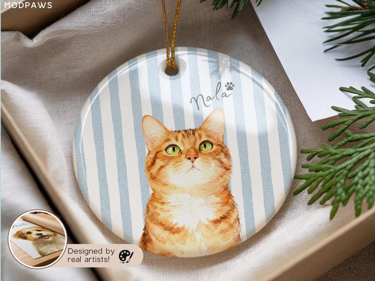 Personalized orange tabby cat ornament with Nala name and blue stripes